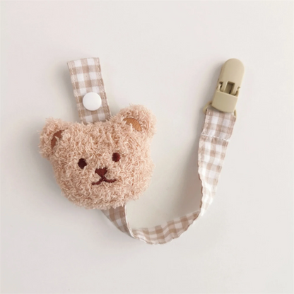 attache tétine beige