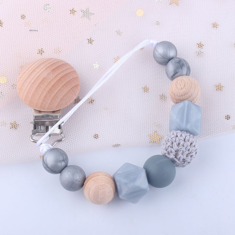 attache tétine gris