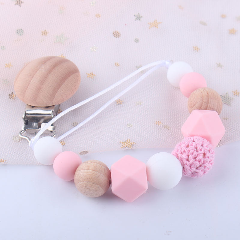 attache tétine rose