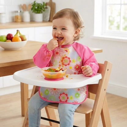 bavoir bébé rose mange