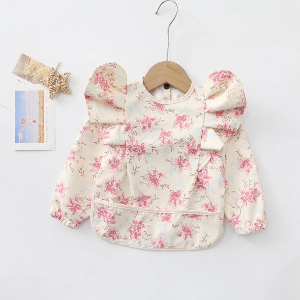bavoir manche longue imperméable fleur